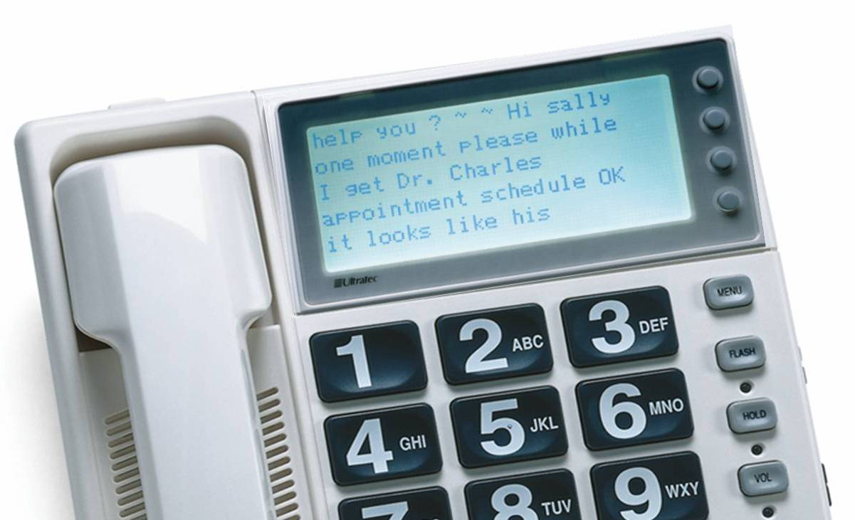 Picture of a CapTel phone, showing text on the screen.