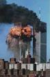 Image of World Trade Center aflame after plane crashes into it.
