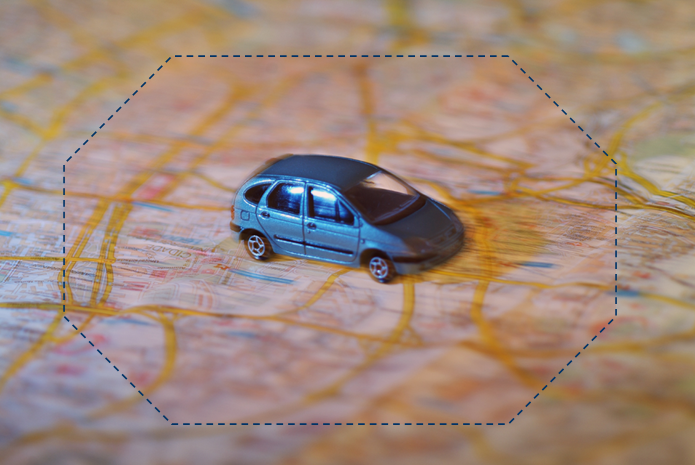 Image shows a map with a car on it, and an octagonal shape around it, representing localization of alerts to persons while they are mobile.