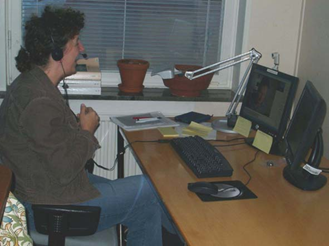 Image of a VRS operator sitting in front of two computer monitors.