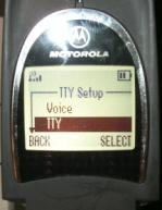 Close-up image of Motorola V60t Menu.  Menu shows TTY Setup, and options of Voice or TTY.